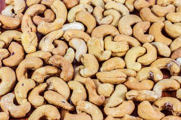 cashew nuts pattern texture of dried fruits in square composition