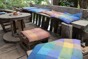 wood seat and cushion on terrace balcony with forest view