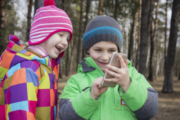 Spring in the forest boy with the girl with delight something co