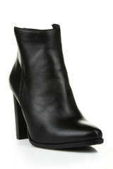 
Female black boots isolated on a white background.