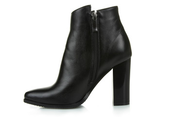 
Female black boots isolated on a white background.