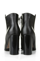 Female black boots isolated on a white background.