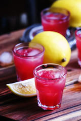 Watermelon, lemon drink, black background, selective focus