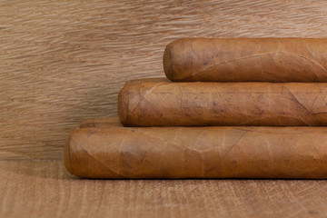 Luxury Cuban cigars  on the wooden desk