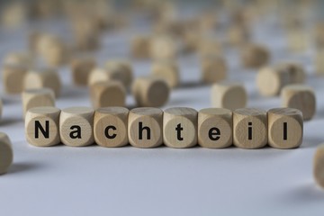 Nachteil - Holzwürfel mit Buchstaben
