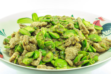 Fried spices pork with bitter bean(Parkia speciosa) thai food