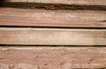 Old weathered wood planks painted in red