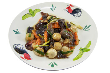 Roasted mushrooms with dill on the white plate