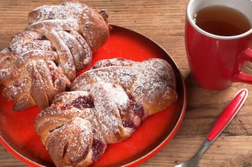 Buns with jam and tea