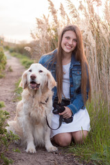 Girl with her Golden Retriever.