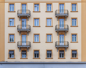 Fototapeta premium Modern orange building with windows