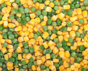 Frozen organic peas and corn like artistic background