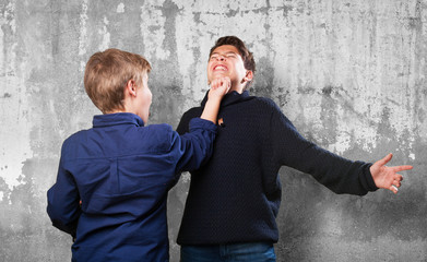 boys fighting on white background