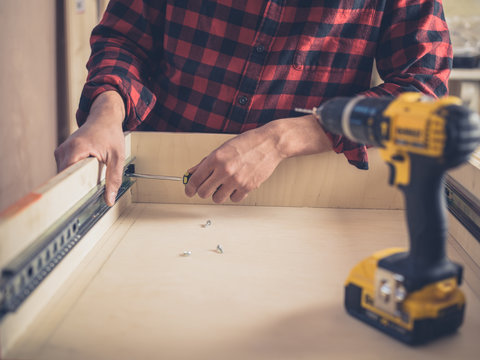 Carpenter building a drawer