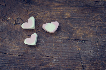 Fototapeta premium Heart marshmallow on wooden background
