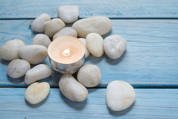 Fototapeta na wymiar pebbles and candle