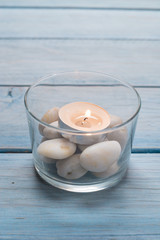   pebbles and candle