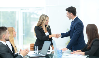 Business people shaking hands, finishing up a meeting