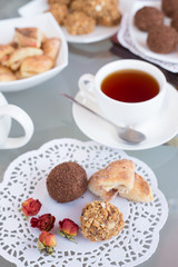 chocolate balls on the table close-up, different food, apple and walnut