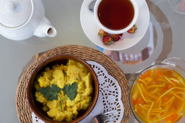 decorated table, a business lunch, hot soup, a cup of tea, Vegetarian
