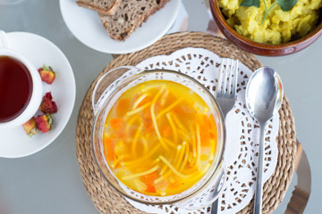 decorated table, a business lunch, hot soup, a cup of tea, Vegetarian