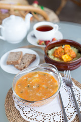 decorated table, a business lunch, hot soup, a cup of tea, Vegetarian