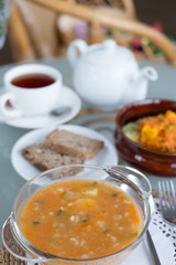 decorated table, a business lunch, hot soup, a cup of tea, Vegetarian