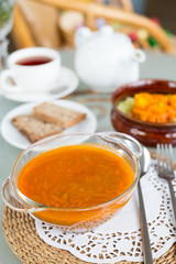 decorated table, a business lunch, hot soup, a cup of tea, Vegetarian