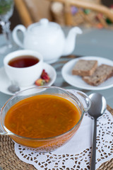 decorated table, a business lunch, hot soup, a cup of tea, Vegetarian