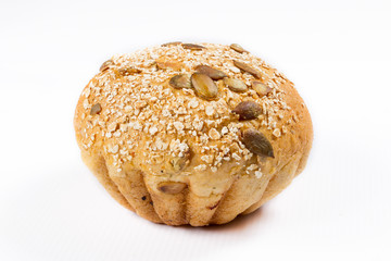 small bread in a basket on a white background, studio photo