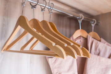 bathrobe with wooden hangers in clothe set