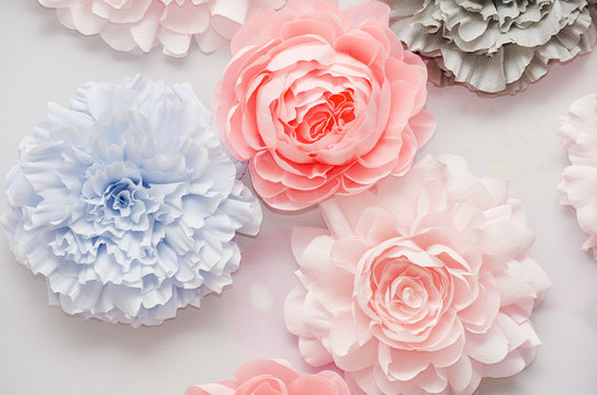 Decorative colorful paper flowers at the wedding ceremony