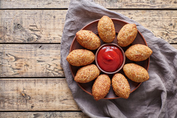 Kibbeh traditional middle eastern arabic lamb meat kofta meatball croquettes on vintage wooden table background