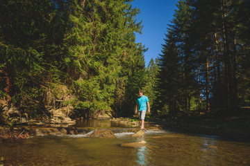 Bathing feet in mountain river