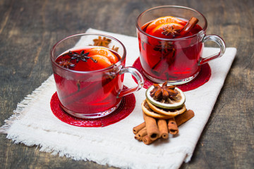 Winter hot drink with fruits and spices. Selective focus.