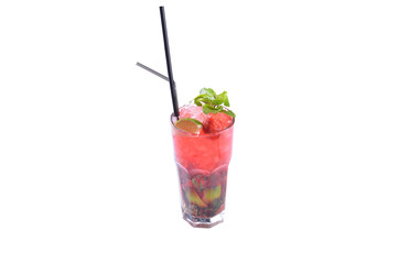 Mojito drink with berries lime mint with ice in a glass