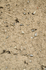 Old wall plastered with mud closeup