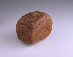 one loaf of bread close-up on a white background with reflection