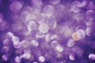 the  Abstract blur purple  bokeh lighting from glitter texture