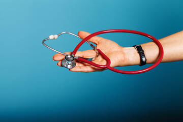 Stethoscope close-up in the doctor's hand