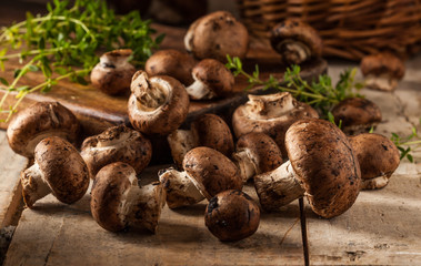 Portobello mushrooms on a wooden table