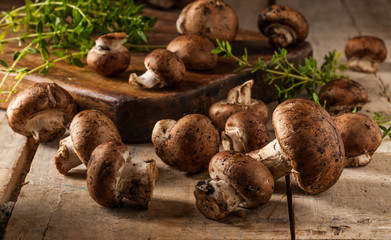 Portobello mushrooms on a wooden table