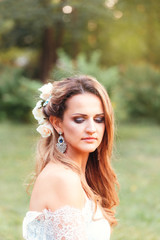 Naklejka premium Portrait of a beautiful cheerful young woman, looking down