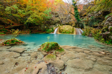 colorful autumn at urederra in navarre, spain