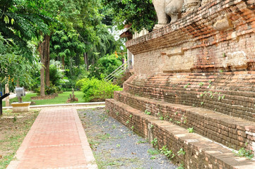 Green yard and walk way be side Buddha Church