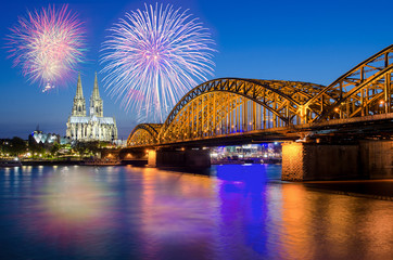 Fototapeta premium Cologne Cathedral and Hohenzollern Bridge with Fireworks