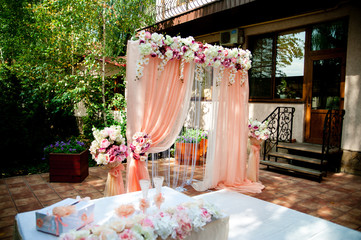Pink wedding arch
