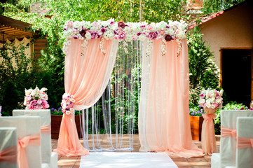 Pink wedding arch