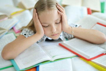 Stressed blond schoolgirl