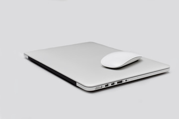 steel laptop on a light table